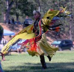 Photo by Barbara Ezell: Ivory Gardner performs a "fancy shawl dance" at a past Indian Fair Days and Pow-Wow in North Fork, California. This year's event is August 4 and 5.
